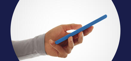 Hand holding a blue smartphone