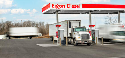 Exxon diesel station with semi trucks at the fuel pumps