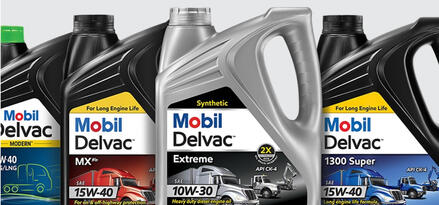 four containers of Mobil Delvac engine oil