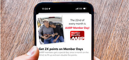 A phone screen showing a pop-up with text: The 22nd of every month is AARP member day. Get 2X points on Member Days.