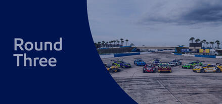 Multiple Porsche Carrera race cars in many colors with text: Round Three.